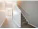 View of hallway and staircase with plush carpeting and modern paint at 4544 Parkview Sq, Atlanta, GA 30349