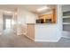 Bright kitchen featuring lots of cabinets and an open connection to other living areas at 4544 Parkview Sq, Atlanta, GA 30349