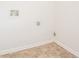 Bright laundry room with tile floors and utility connections at 4544 Parkview Sq, Atlanta, GA 30349