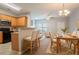 Open concept featuring the kitchen, dining, and living spaces, with lots of room for entertaining at 4544 Parkview Sq, Atlanta, GA 30349