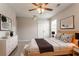 This main bedroom is decorated with nice decor and furnished with a comfy bed and dresser at 4544 Parkview Sq, Atlanta, GA 30349