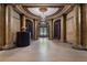 Stately building lobby with marble columns, decorative lighting, and beautiful architectural features at 75 Ponce De Leon Ave # 701, Atlanta, GA 30308
