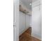 Walk-in closet with hardwood floors and ample shelving at 75 Ponce De Leon Ave # 701, Atlanta, GA 30308