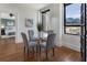 Charming dining area with a glass-top table, comfortable chairs, and city views at 75 Ponce De Leon Ave # 701, Atlanta, GA 30308