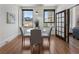 Bright dining area with hardwood floors, natural light, and modern furnishings at 75 Ponce De Leon Ave # 701, Atlanta, GA 30308