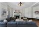 Cozy living room featuring fireplace, sofa, area rug, and decor at 75 Ponce De Leon Ave # 701, Atlanta, GA 30308