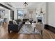 Bright living room with hardwood floors, fireplace, and comfortable seating arrangement at 75 Ponce De Leon Ave # 701, Atlanta, GA 30308