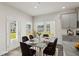 Dining Room is bright and features a door to the back yard at 7760 Sheffield Ter, Fairburn, GA 30213