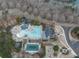 Aerial view of community pools, lakes, clubhouse, and playground; perfect for recreation and relaxation at 106 Twilight Overlook, Canton, GA 30114