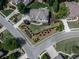 Stunning aerial view of the property showcasing its manicured landscaping and desirable neighborhood location at 106 Twilight Overlook, Canton, GA 30114