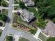 Aerial view showcases a home with immaculate landscaping in a charming neighborhood at 106 Twilight Overlook, Canton, GA 30114