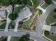 Aerial view of a home with lush landscaping, well manicured lawn, and mature shade trees at 106 Twilight Overlook, Canton, GA 30114