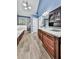 Spacious primary bathroom featuring dark cabinets, dual sinks and a large, glass enclosed shower at 106 Twilight Overlook, Canton, GA 30114