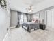Comfortable bedroom with neutral colors, large window, plush carpet and queen bed at 106 Twilight Overlook, Canton, GA 30114