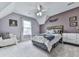 Comfortable bedroom with a queen-sized bed, carpeted floor and ceiling fan at 106 Twilight Overlook, Canton, GA 30114