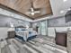 Spacious primary bedroom with wood tray ceiling, gray walls, and natural light at 106 Twilight Overlook, Canton, GA 30114