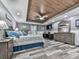 Large primary bedroom with a tray ceiling, wood ceiling, and ensuite bathroom at 106 Twilight Overlook, Canton, GA 30114