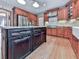 Spacious kitchen featuring a center island, stainless appliances, and wood cabinets at 106 Twilight Overlook, Canton, GA 30114