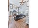 Comfortable living room with hardwood floors, tall ceilings, and a cozy fireplace at 106 Twilight Overlook, Canton, GA 30114