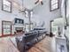 Bright living room features vaulted ceilings, a stone fireplace, and plenty of natural light at 106 Twilight Overlook, Canton, GA 30114