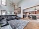 Open-concept living room boasts hardwood floors and seamless transition to the kitchen and dining areas at 106 Twilight Overlook, Canton, GA 30114
