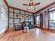 Cozy living room with unique paneling, plush seating, and natural light from open shutters at 106 Twilight Overlook, Canton, GA 30114