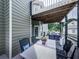 Outdoor patio with dining table and lounge seating, perfect for relaxing and entertaining outdoors at 106 Twilight Overlook, Canton, GA 30114