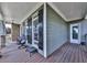 Cozy covered porch with rocking chairs offers a relaxing outdoor space at 106 Twilight Overlook, Canton, GA 30114