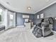 Cozy sitting area with walkout, desk, and oversized massage chair at 106 Twilight Overlook, Canton, GA 30114