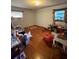 Bedroom featuring wood floors and a sunlit window at 3838 Dunbury Ln, Decatur, GA 30032