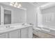Bathroom includes double sinks, a tub/shower, and a skylight at 6541 Lazy Creek Ct, Lithonia, GA 30058