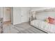 Cozy bedroom with a twin bed, a neutral color scheme, and plush carpeting at 99 Silver Leaf Trce, Douglasville, GA 30134