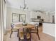 Cozy breakfast nook near kitchen with sleek pendant lighting and views to the outside at 99 Silver Leaf Trce, Douglasville, GA 30134