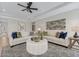 Elegant living room featuring two sofas, a plush rug, and ample seating space for entertaining at 99 Silver Leaf Trce, Douglasville, GA 30134