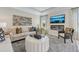 Stylish living room with modern fireplace, TV, neutral tones, and coordinated decor elements at 99 Silver Leaf Trce, Douglasville, GA 30134
