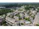 Aerial view of a neighborhood with a swimming pool and clubhouse at 2250 Norbury Se Dr, Smyrna, GA 30080
