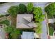 Aerial view of home showcasing the roof, deck, yard, and surrounding landscape at 2250 Norbury Se Dr, Smyrna, GA 30080