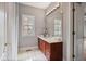 Bathroom featuring tile floors, a vanity, and a large mirror at 2250 Norbury Se Dr, Smyrna, GA 30080