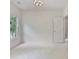 This room features fresh white paint, a large window, and access to an adjoining hallway at 2250 Norbury Se Dr, Smyrna, GA 30080