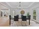 Dining room with modern chandelier and access to the backyard at 2250 Norbury Se Dr, Smyrna, GA 30080