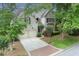 Beautiful two-story brick home with a two car garage and mature trees providing ample shade at 2250 Norbury Se Dr, Smyrna, GA 30080