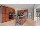 Kitchen with stainless steel appliances, cherry wood cabinets, and granite countertops at 2250 Norbury Se Dr, Smyrna, GA 30080