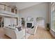 Open concept living room with fireplace, hardwood floors, and natural light at 2250 Norbury Se Dr, Smyrna, GA 30080