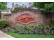 Paces Ferry Registry entrance sign with manicured flowers and mature shrubbery at 2250 Norbury Se Dr, Smyrna, GA 30080