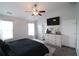 Bright bedroom with ensuite bath, vaulted ceiling, and a comfortable bed at 2428 Black Forest Dr, Conyers, GA 30012
