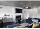 Bright living area with a modern fireplace, mounted TV, and stylish decor at 2428 Black Forest Dr, Conyers, GA 30012