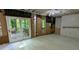 Unfinished basement with sliding glass doors to a deck and a window at 3246 Able Ct, Marietta, GA 30062