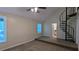 Large carpeted bedroom features vaulted ceiling, ceiling fan, neutral trim, and an eye-catching spiral staircase at 3246 Able Ct, Marietta, GA 30062