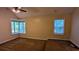 Spacious bedroom with vaulted ceiling, ceiling fan, neutral carpet and trim, and large windows for natural light at 3246 Able Ct, Marietta, GA 30062