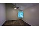 Spacious carpeted bedroom features vaulted ceiling, ceiling fan, neutral walls, trim, and a large bay window at 3246 Able Ct, Marietta, GA 30062